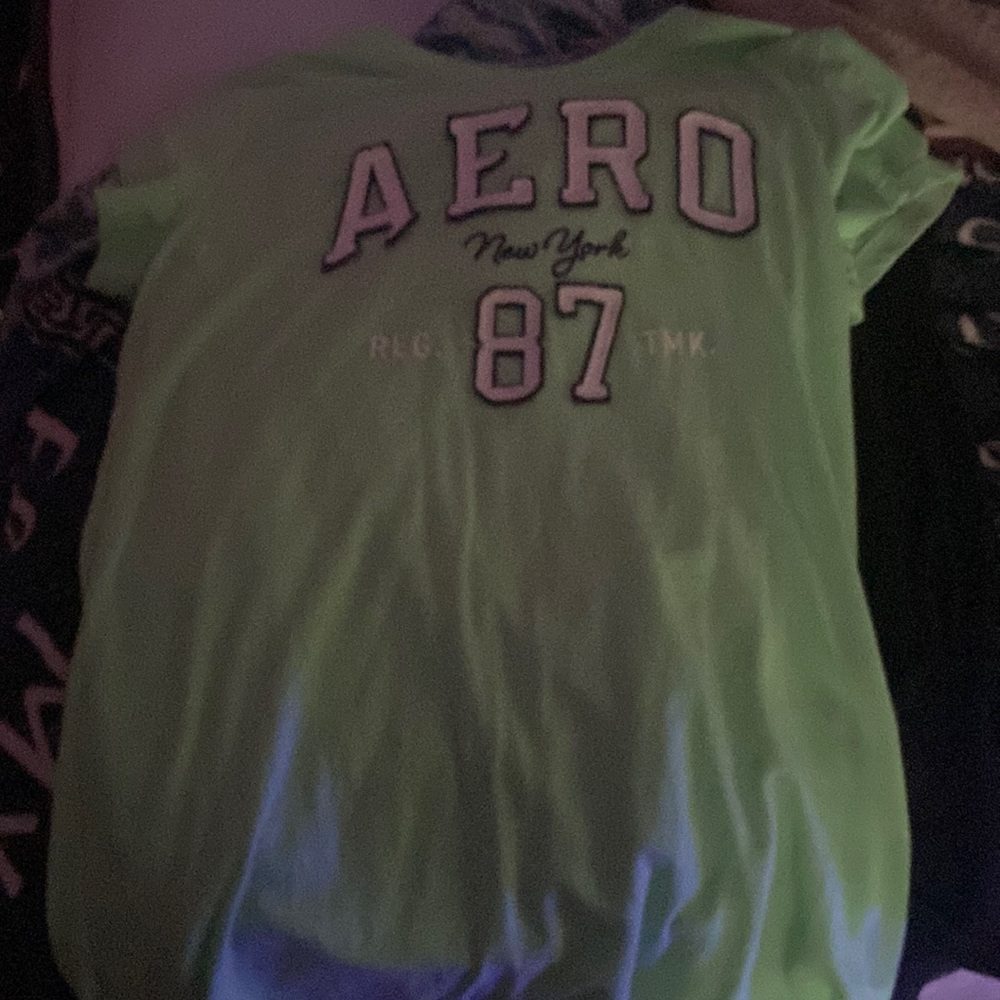 im selling a areo new york shirt its a kinda teal color